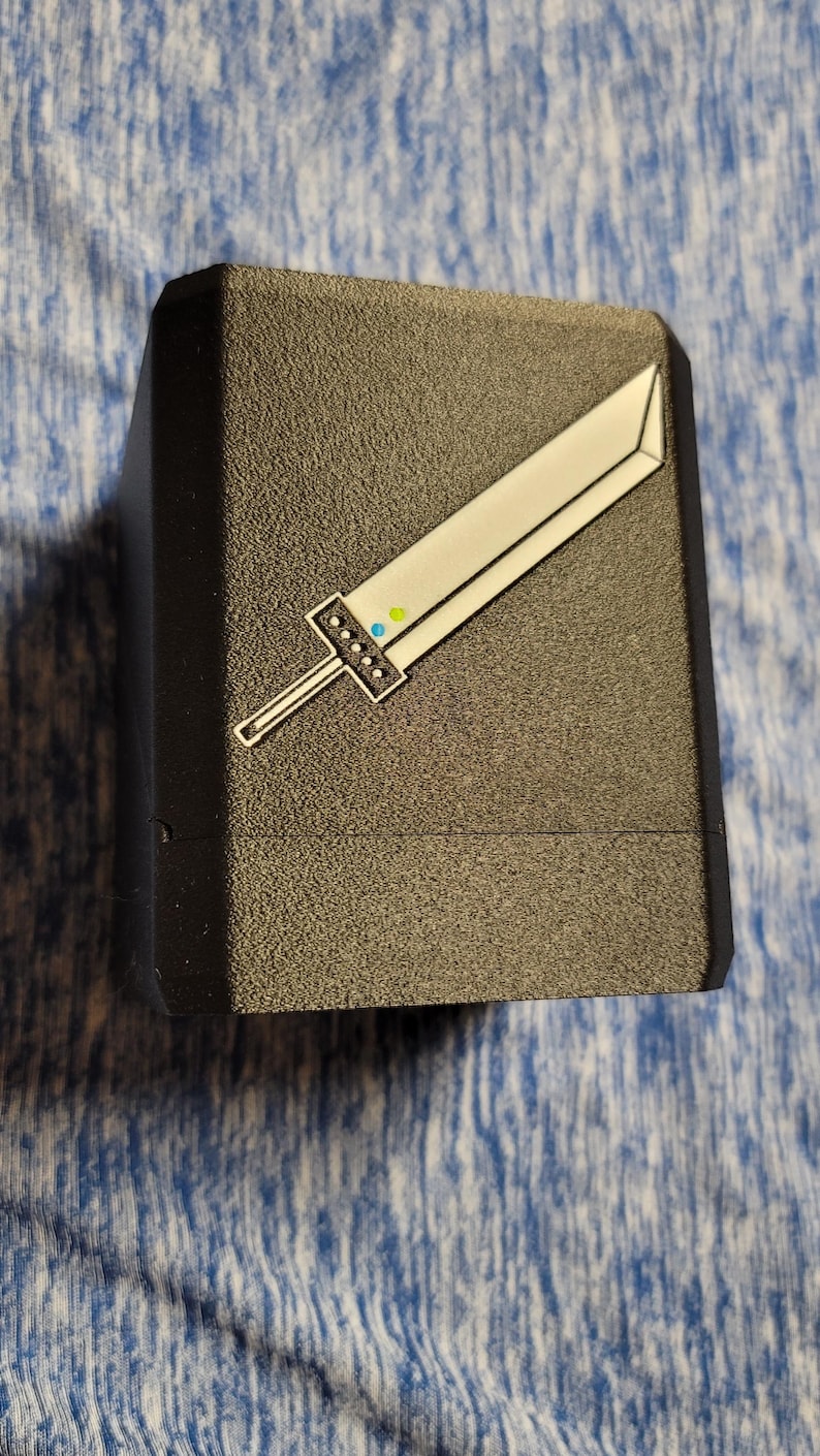 Angled view of the Cloud deck box and sword artwork