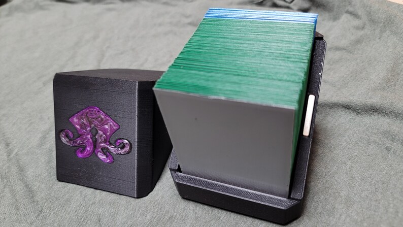 Purple Eldrazi box open with a deck of cards inside