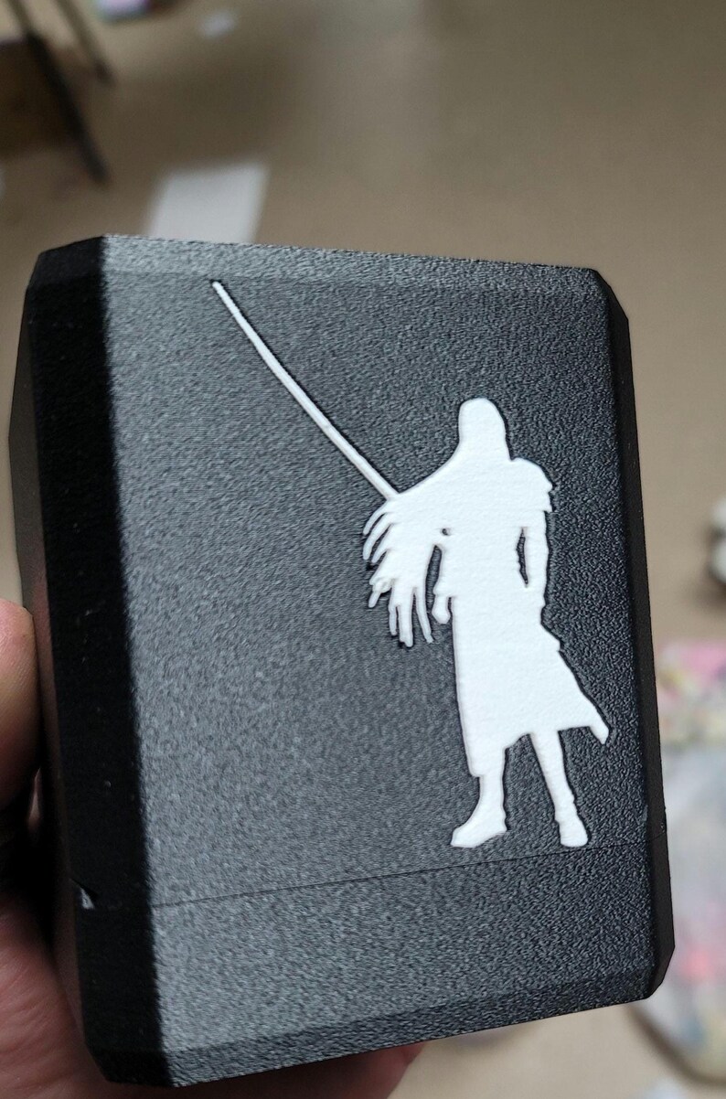 Sephiroth deck box with white character and sword artwork